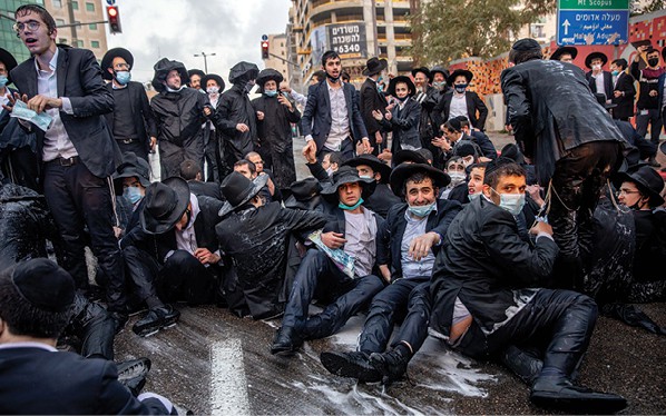 מפגינים בירושלים. התיקון של החרדים הוא הפטריוטיזם הלאומני // צילום: אוהד צויגנברג, ׳הארץ׳